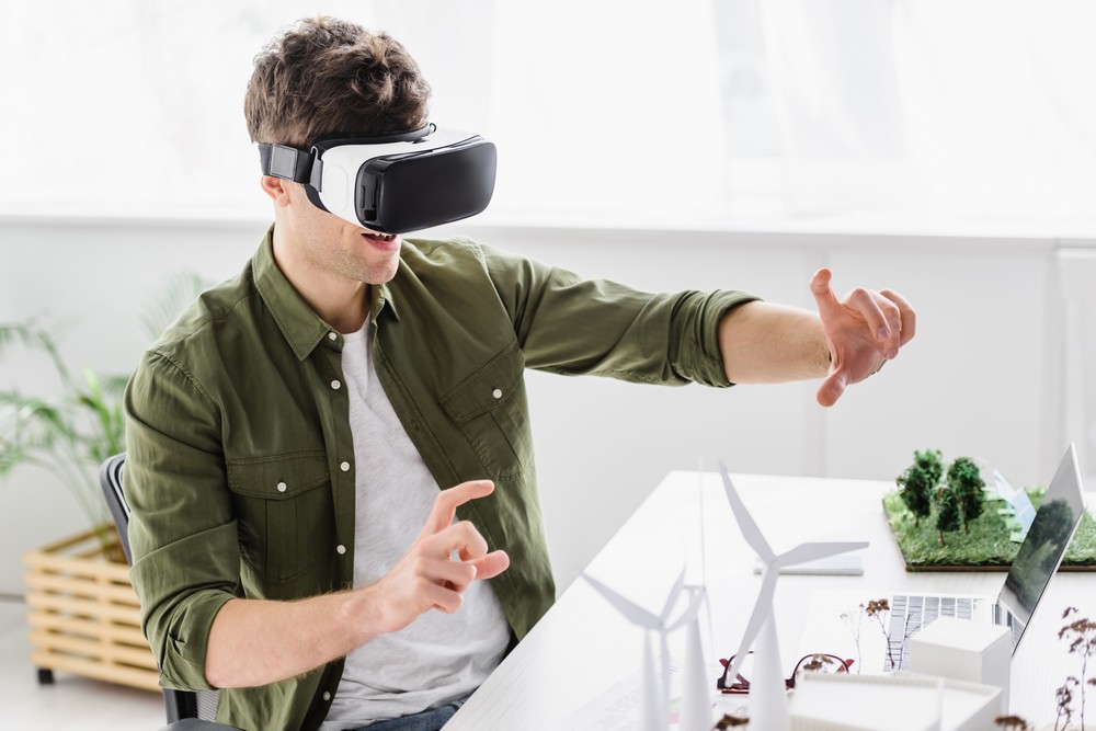 architect in virtual reality headset sitting at ta 2023 11 27 05 29 21 utc